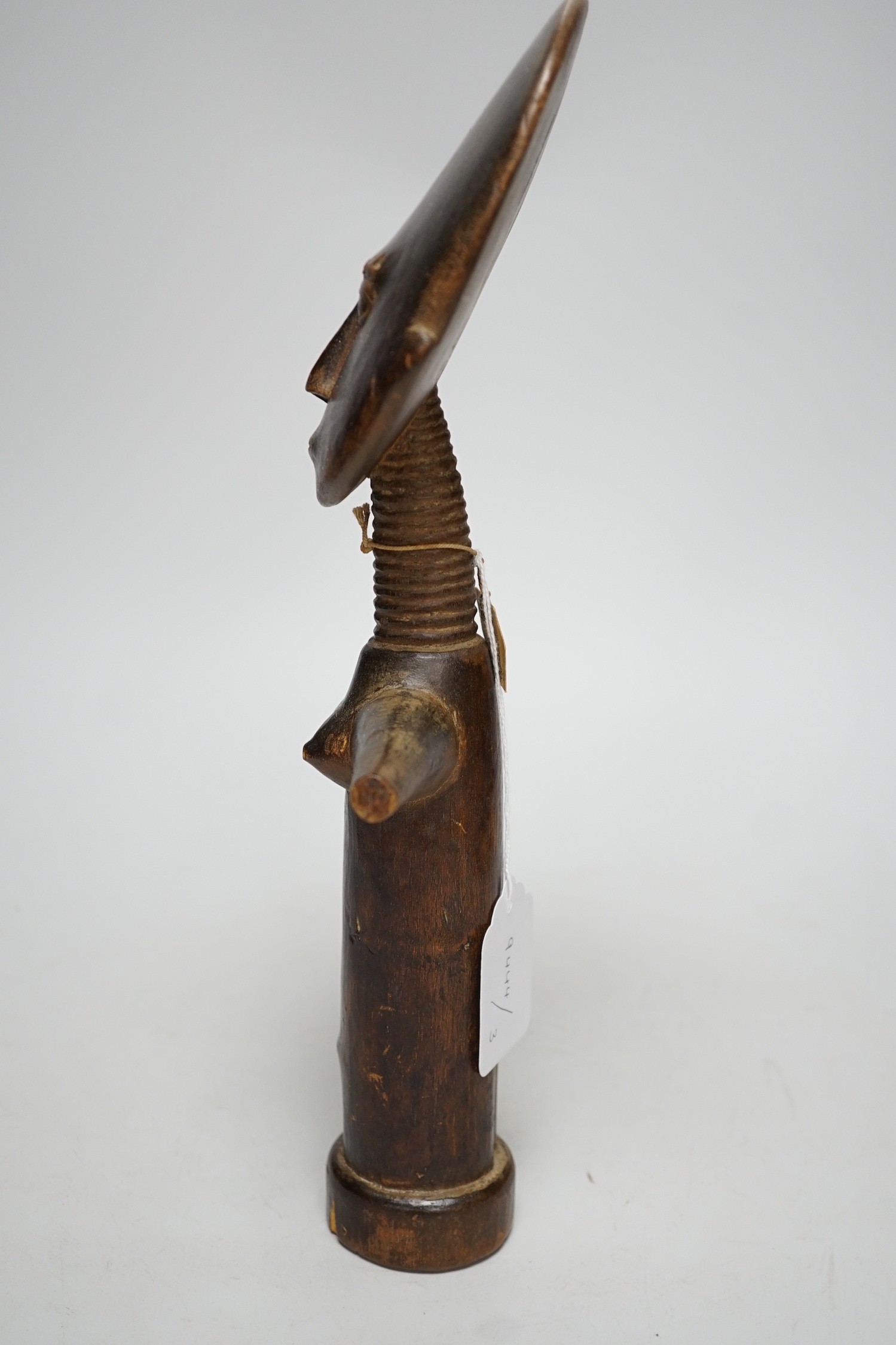 A wooden fertility figure, Ashanti, 34.5cm